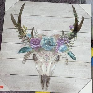Bull skull with antlers and flowers